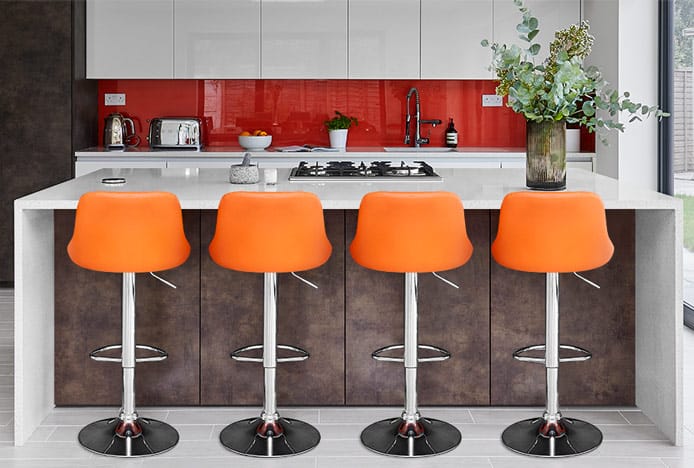 Balanced Kitchen Space With Orange Stools