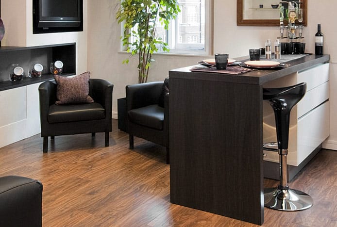 Black Stool at Freestanding Kitchen Island