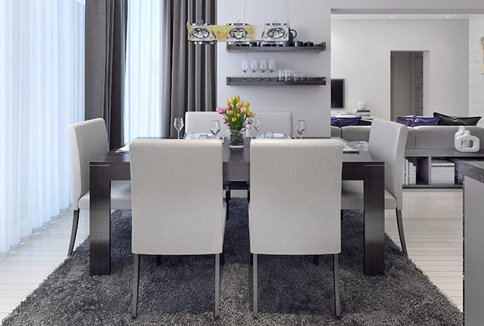 Designer White Chairs at Brushed Steel Dining Table