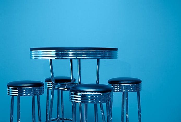 Chrome American Diner Stools Blue Background