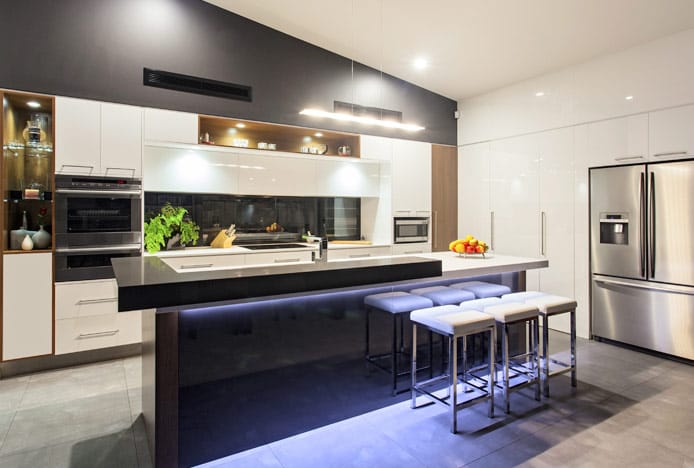 Cabana Bar Stool In Kitchen With Contrasting Light