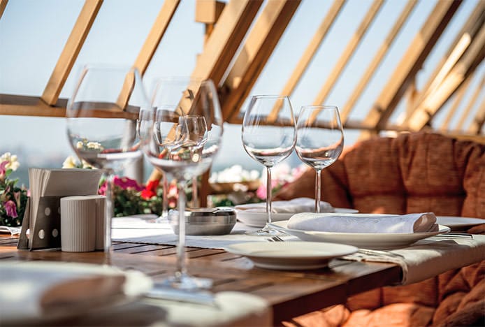 Dining Table with Glasses and Plates