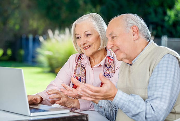 Elderly Couple Shopping Online