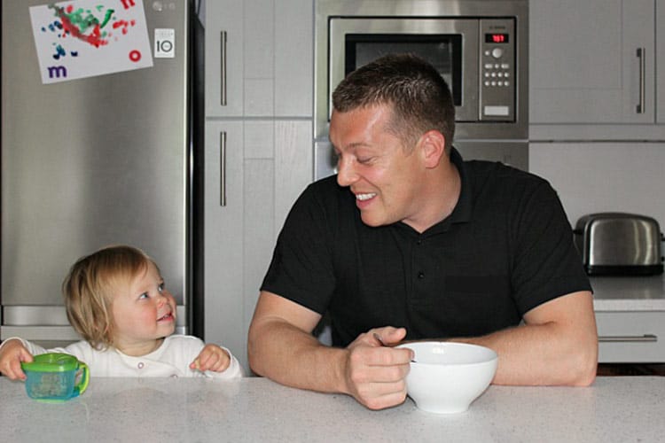 Famther And Daughter In Family Kitchen