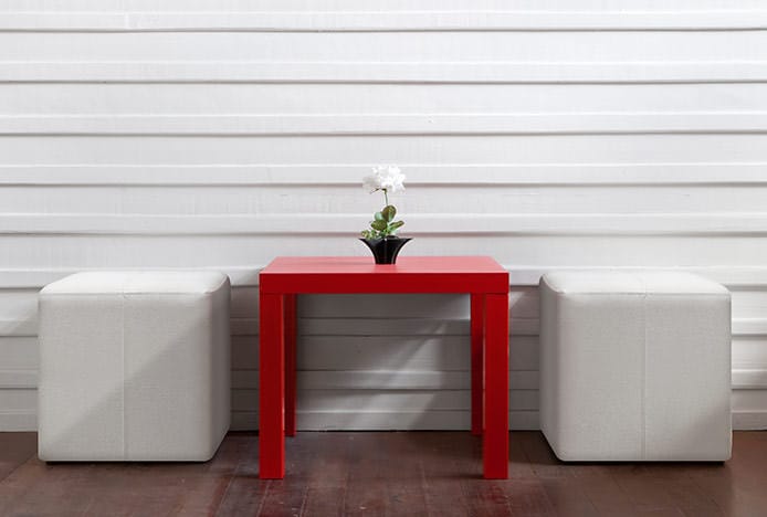 Low White Stools with Red Table