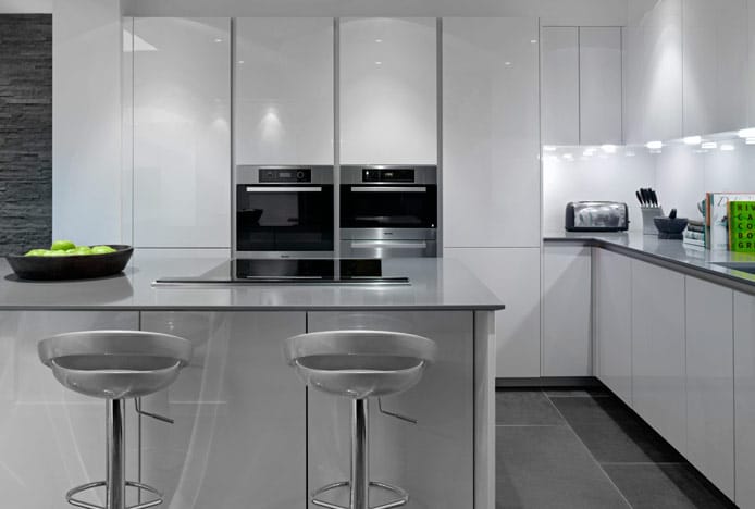 Metallic Kitchen With Crescent Bar Stools