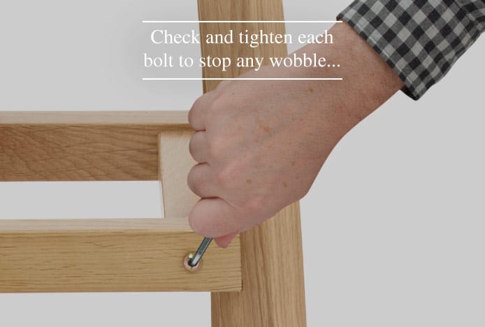 Tightening Screws On A Wooden Frame