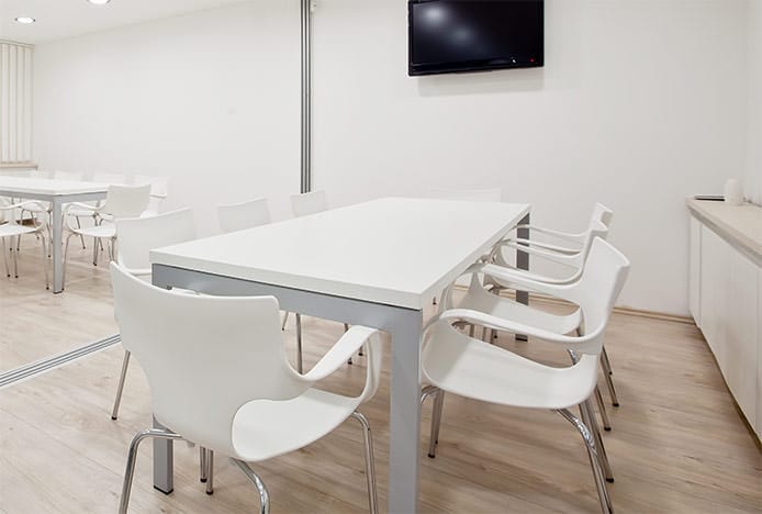 White Chairs in White Dining Room